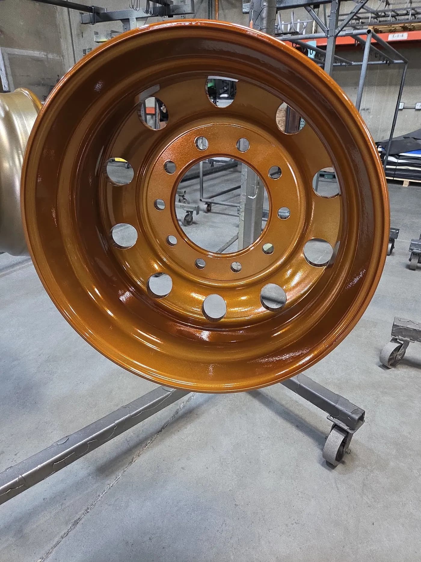 Automotive wheel with bright copper powder coated finish.